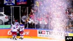 Russian players leave the ice after losing the gold-medal match against Canada on May 17.