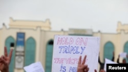 Libyan protesters chant antigovernment slogans on a main square in Tobruk on February 22.