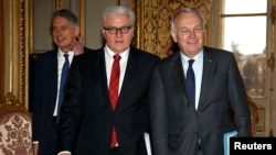 French Foreign Minister Jean-Marc Ayrault, German Foreign Minister Frank-Walter Steinmeier, and British Foreign Secretary Philip Hammond