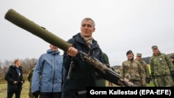 NATO Secretary-General Jens Stoltenberg visits the NATO-led military exercise Trident Juncture in Trondheim, Norway, on October 30.