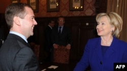 Russian President Dmitry Medvedev (left) meets with U.S. Secretary of State Hillary Clinton.