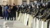 Riot police line up at a rally against a lockdown order in Vladikavkaz, North Ossetia, in Russia's North Caucasus.