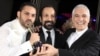 Asghar Farhadi (center), director of the Iranian film "A Separation," poses with actor Peyman Maadi (left) and director of photography Mahmud Kalari at the 84th Academy Awards in Hollywood after winning the Oscar for best foreign-language film in 2012.