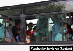 Commuters wearing masks in "virus-free" Ashgabat