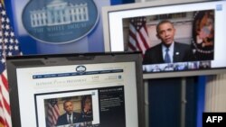 U.S. President Barack Obama participates in an interview with YouTube and Google users from the White House.