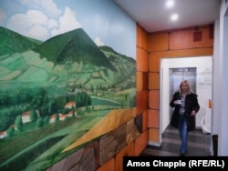 A woman walks in a corridor of the Hotel Pyramid of the Sun -- one of several pyramid-themed businesses in Visoko.