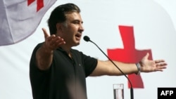 President Mikheil Saakashvili addresses supporters at a rally of his ruling United National Movement party in Batumi on September 29, 2012.