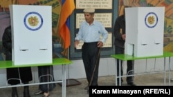 The Armenian government says allowing expatriates to vote is too costly.