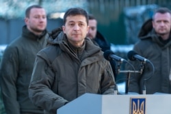 Ukrainian President Volodymyr Zelenskiy speaks during a meeting with soldiers while visiting the Donetsk region on December 6. His election campaign was filled with promises of peace.