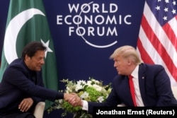 U.S. President Donald Trump shakes hands with Pakistani Prime Minister Imran Khan during a bilateral meeting at the 50th World Economic Forum annual meeting in Davos, in January. (file photo)