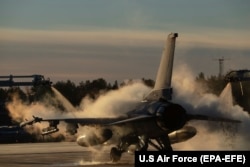 A U.S. Air Force F-16 Fighting Falcon assigned to the 480th Expeditionary Fighter Squadron is deiced in preparation for Trident Juncture at Kallax Air Base in Sweden on October 24.