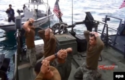 U.S. military personnel are shown on their boat after they were captured by IRGC forces in the Persian Gulf in January 2016.