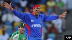 Afghan bowler Hamid Hassan plays an ICC World Twenty20 match with South Africa in May 2010.