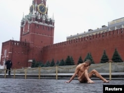 Performance artist Pyotr Pavlensky in Red Square in November 2013