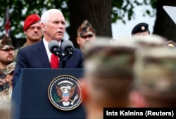 U.S. Vice President Mike Pence speaking to NATO's Enhanced Forward Presence and Estonian troops in Tallinn.