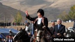 Otunbaeva visits the Kyrgyz region of Osh in October 2011.