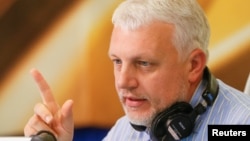 Pavel Sheremet talks on the air at a radio station in Kyiv in October 2015.