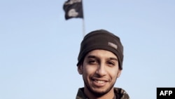 Syria -- An undated picture taken from the February 2015 issue 7 of the Islamic State (IS) group online English-language magazine Dabiq, purportedly shows 27-year-old Belgian IS group leading militant Abdelhamid Abaaoud, also known as Abu Umar al-Baljiki