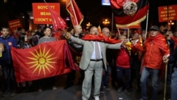 Protesters call for boycotting a referendum on changing the country's name in Skopje on September 30, 2018.