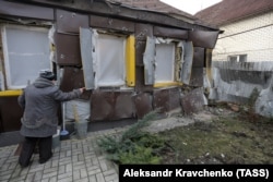 The loyalty of residents of separatist-controlled areas such as the Donetsk region town of Yasnyuvata, seen here after shelling by Ukrainian government troops in December 2017, might be tested if Ukraine's chief military prosecutor gets his way.