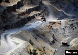 Trucks transport a load at the copper mine in the eastern Serbian town of Bor.