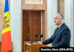 Moldovan President Igor Dodon speaks at a press conference in Chisinau on June 11.