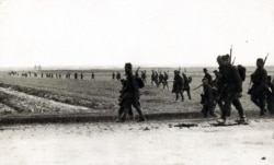 Polish forces advance during the battle for Warsaw.