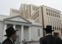 Visitors arrive at the newly opened Jewish Menorah Center in Dnipro (then Dnipropetrovsk) in October 2012.