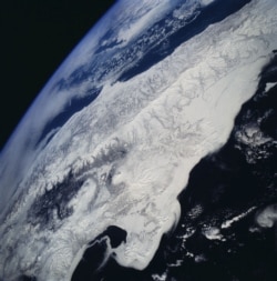 A space observatory view of Russia's Kamchatka Peninsula and its ice-encrusted volcanic region in 2014.