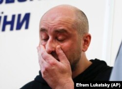 Babchenko reacts during the news conference in Kyiv on May 30.