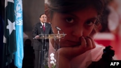 Pakistani President Asif Ali Zardari delivers a speech during the "Stand Up For Malala" event in Paris on December 10.