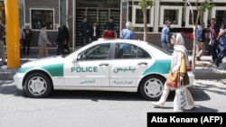 Police patrol exchange shops to ensure that no under-the-table currency trading is going on.