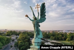 Budapest's Archangel Gabriel is depicted holding a cross and the holy crown of St. Stephen, Hungary's first king.