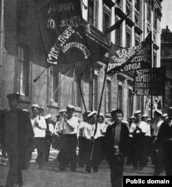 Kronstadt sailors march in Petrograd (the name for St. Petersburg from 1914-24) in the summer of 1917, following the overthrow of Tsar Nicholas II.