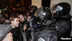 Pro-Russian demonstrators clash with riot police during a protest rally in Donetsk on March 6.