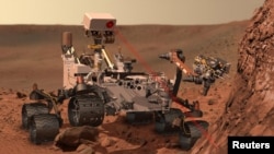 An artist's concept depicts the rover "Curiosity," of NASA's Mars Science Laboratory mission, as it uses its Chemistry and Camera (ChemCam) instrument to investigate the composition of a rock surface.