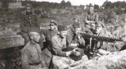 Polish troops just east of Warsaw await the communists.