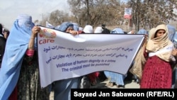 Afghan women during a demonstration condemning domestic violence, held in Kabul earlier this year