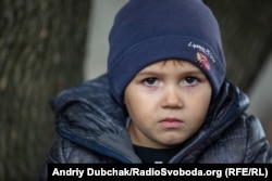 Four-year-old Zhora lives in Zolote. The village is located near the front line in eastern Ukraine and could soon be inside a newly negotiated demilitarized zone.