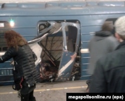 Images showed a door blown off and carnage inside the train car.