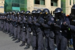 Riot police gathered ahead of the protest.