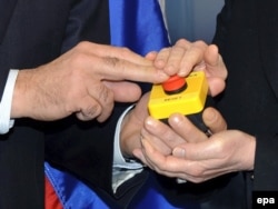 The red button that Hillary Clinton (right) used to symbolically declare a "reset" of U.S. relations with Moscow to her Russian counterpart Sergei Lavrov (left) in Geneva n 2009.