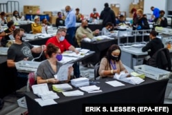 Absentee ballots are processed and verified by election workers in the U.S. state of Georgia this week.