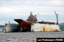 A file photo of the Admiral Kuznetsov aircraft carrier at the PD-50 dry dock in the village of Roslyakovo.