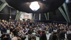 Iranian students attend a memorial for the victims of the Ukraine plane crash at the University of Tehran in January.