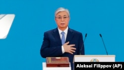 Qasym-Zhomart Toqaev takes the oath of office during his presidential inauguration ceremony in Nur-Sultan on June 12.