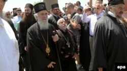 Serbian Orthodox Patriarch Irinej (second from left) arrives to celebrate St. Vitus Day in Gazimestan, where Serbs mark the 1389 Battle of Kosovo Polje.