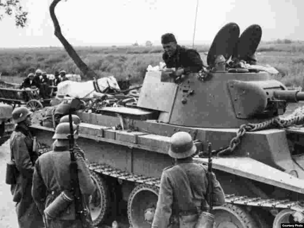 German and Soviet troops meet at the demarcation line, or the so-called &quot;Border of Peace,&quot; in September 1939.