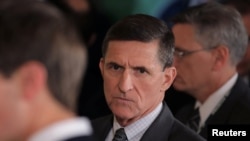 The White House has conceded that U.S. President Donald Trump knew for weeks that former security adviser Michael Flynn had misled his superiors about his contacts with Russia (file photo).