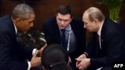 Russian President Vladimir Putin (right) meets with U.S. President Barack Obama on the sidelines of the G20 summit in Antalya, Turkey, on November 15.